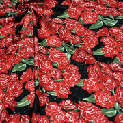 Tissu popeline de coton aux fleurs de roses rouges fond noir - TissusPapi.com