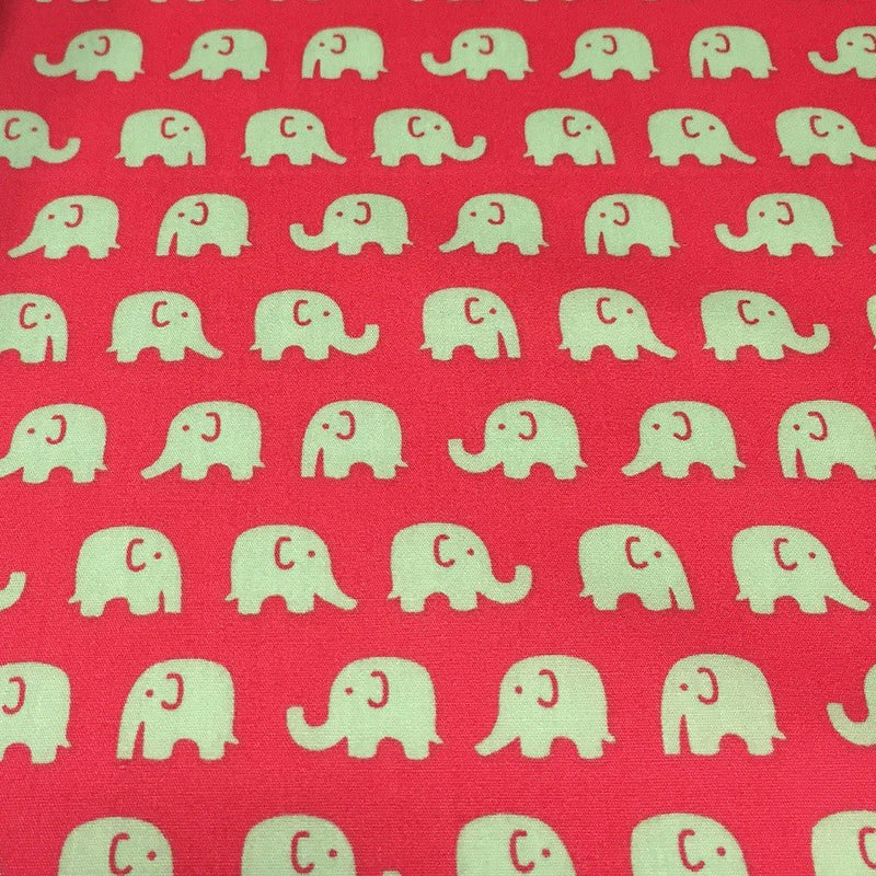 Tissu cotonnade rouge aux éléphants verts - TissusPapi.com