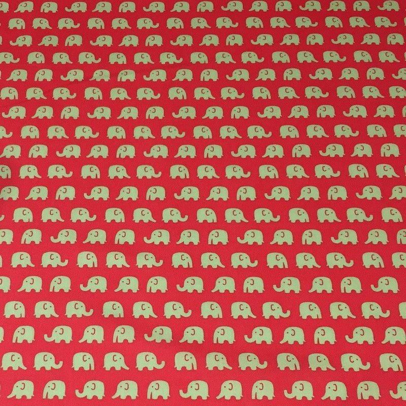 Tissu cotonnade rouge aux éléphants verts - TissusPapi.com