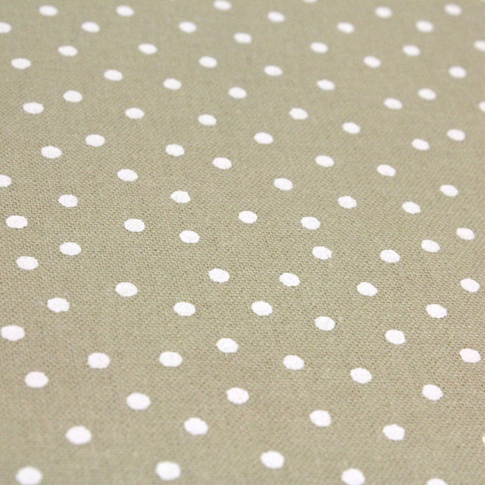 Tissu de coton sable clair à pois blancs