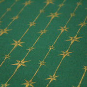 Tissu de coton de Noël aux étoiles & liserés dorés, fond vert - TissusPapi.com