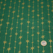 Tissu de coton de Noël aux étoiles & liserés dorés, fond vert - TissusPapi.com