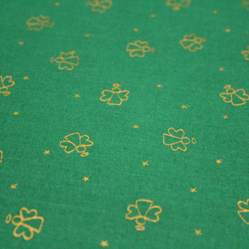 Tissu de coton de Noël aux anges dorés, fond vert - tissuspapi