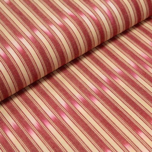 Tissu de coton crème à liserés rouges & motif ikat - tissuspapi